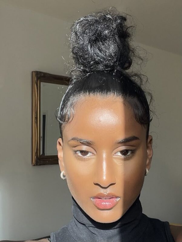 black girl sleek bun hairstyle