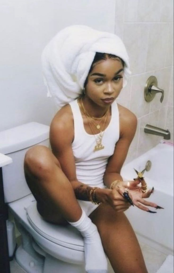 Gen Z wellness trend - black girl in bathroom pose aesthetic